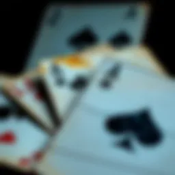 Close-up of faded spade cards showcasing their wear and tear